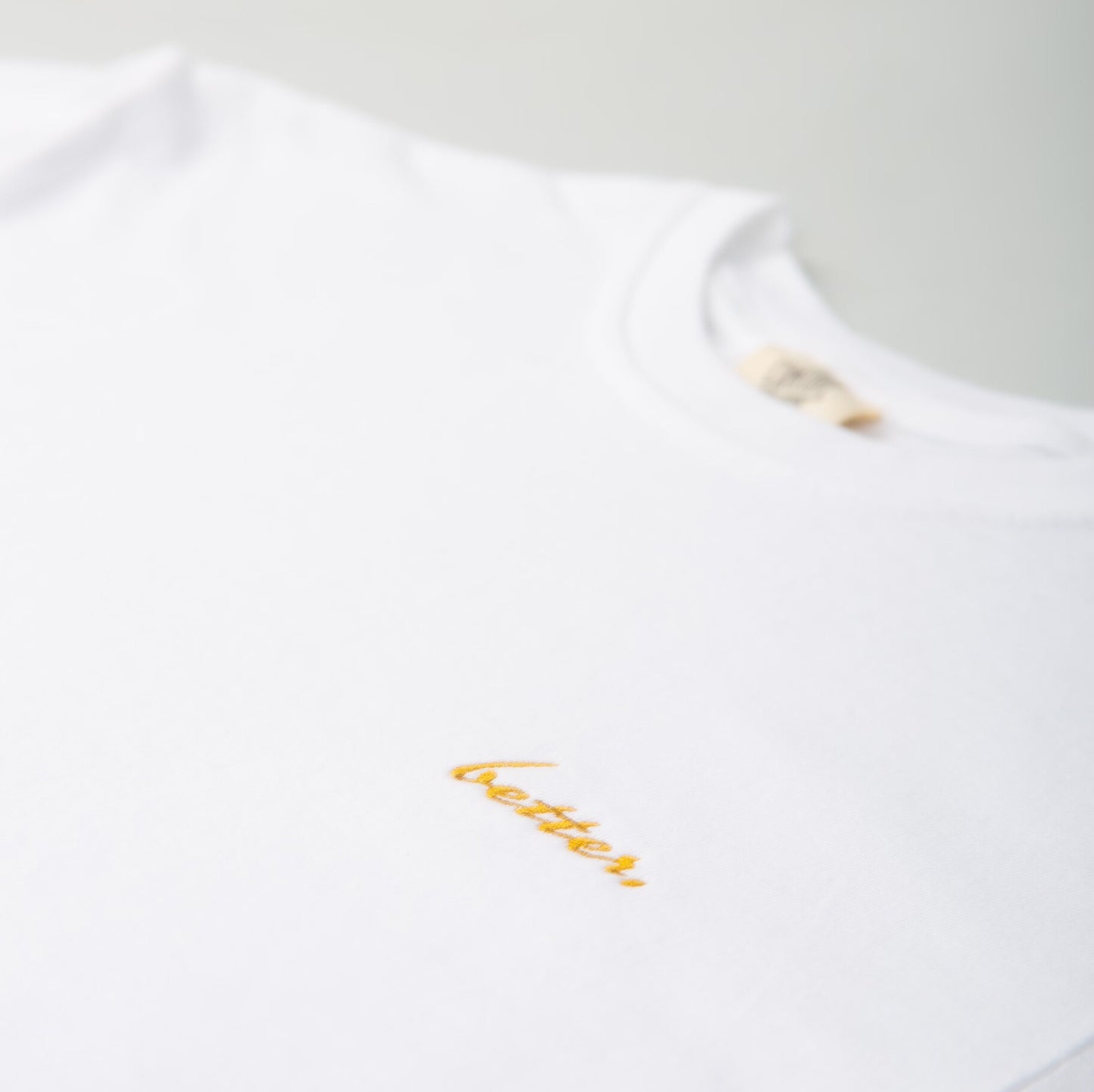 better. Logo Tee (White/Gold)